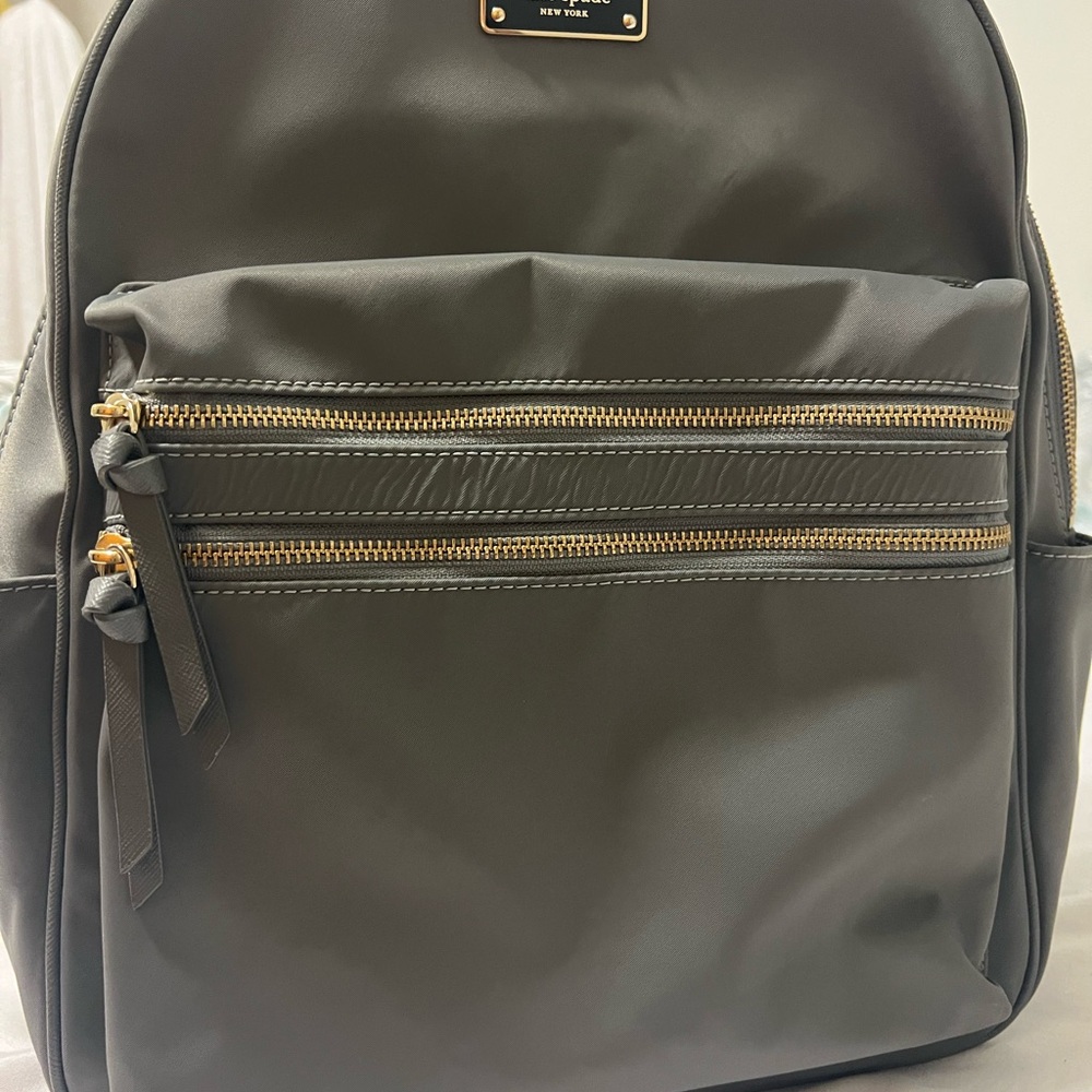 Kate Spade Gray Interior with Gold Logo
